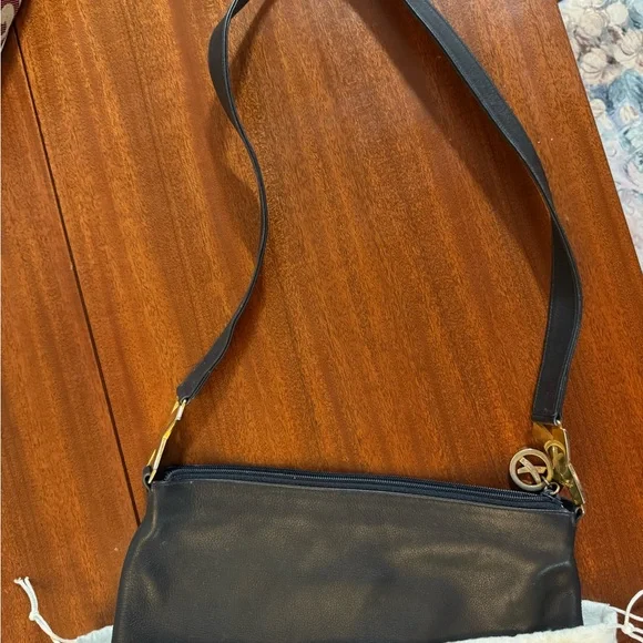 Paloma Picasso Elegant Black Shoulder Bag with Gold Details